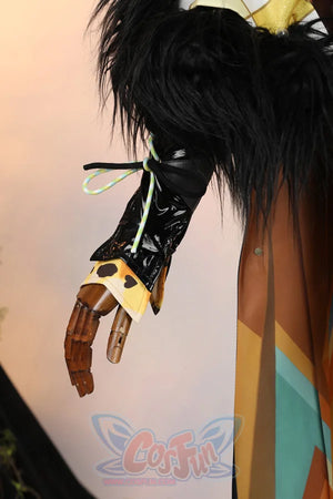 Genshin Impact Xilonen cosplay sleeves layer a black textured arm sleeve over a yellow heart-patterned cuff with black fur.