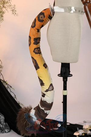 Genshin Impact Xilonen cosplay tail pairs a leopard print stuffed animal tail with a transparent vinyl attachment belt.