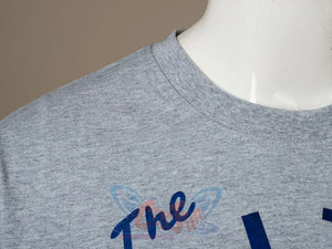 Venom: The Last Dance Eddie Brock cosplay t-shirt collar area frames blue script reading The on heathered grey fabric.