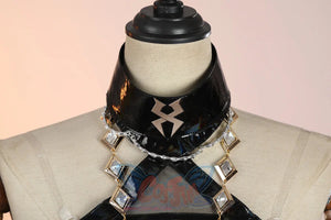 Genshin Impact Xilonen cosplay necklace drops a gold-framed gem chain from a black faux-leather choker over a mesh top.