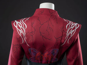 Rhaenyra Targaryen cosplay jacket traces silver designs across wide epaulets over a high-necked red back panel.