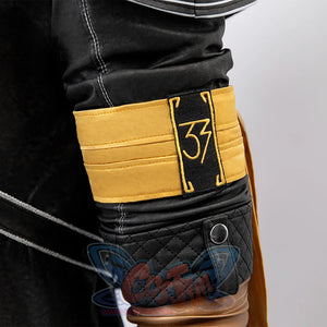 Clair Obscur: Expedition 33 Gustave cosplay armband sets embroidered number 33 against quilted black sleeve.