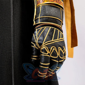 Clair Obscur: Expedition 33 Gustave cosplay gauntlet frames gold trim detail alongside matching black garment section.