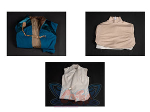 The Acolyte Mon Mothma cosplay set pairs a blue-green jacket and beige ribbed turtleneck alongside a white buckle waistcoat.