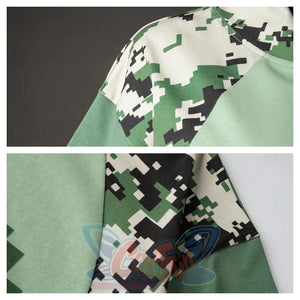Detail view of summer camo monkey shirt cuffs displaying fabric texture and color variations