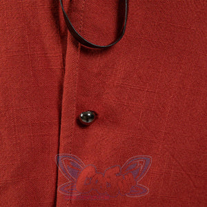 Japanese Anime Monkey D. Luffy cosplay vest fabric close-up anchors one metallic silver button on dark rust weave.