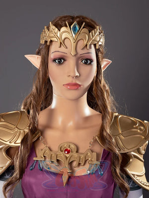 Twilight Princess Zelda cosplay armor sets blue-jeweled diadem above gold breastplate and teal-dangle pauldrons.