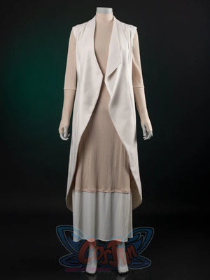 The Acolyte Mon Mothma cosplay tunic sets a three-quarter-sleeve textured beige piece over a white skirt and sleeveless.
