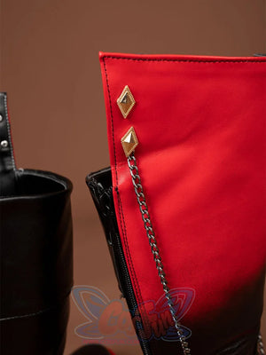 Genshin Impact Tartaglia Childe cosplay boot framing a red cuff with gold diamond accents and a cascading metal chain detail.