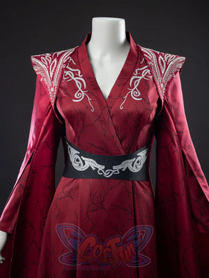 Rhaenyra Targaryen cosplay gown pairs white shoulder embroidery over vine-patterned crimson fabric anchored by a silver.