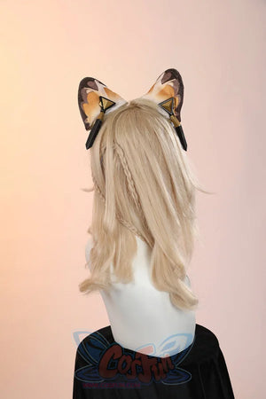Genshin Impact Xilonen cosplay ears headpiece pairs brown and tan patterned faux animal ears with black strap anchors.