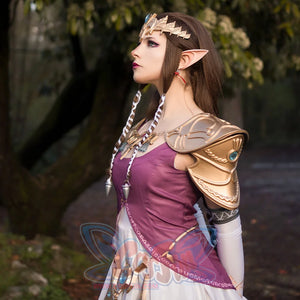 Twilight Princess Zelda cosplay dress pairs gold tiara above purple tunic and patterned sashes in full front view.