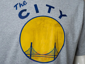 Venom: The Last Dance Eddie Brock cosplay t-shirt centers a blue and yellow circular bridge logo on heather grey chest.