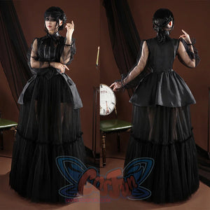 Addams black evening dress front and back view with mesh sleeves and Victorian styling