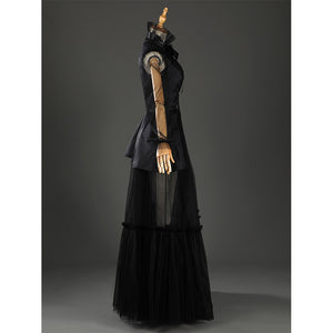 Addams black evening dress with arms raised showcasing full silhouette and sleeves