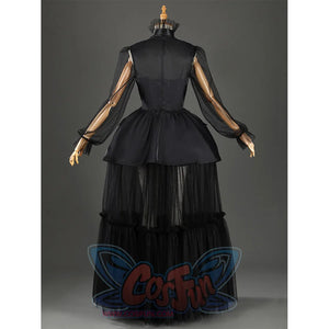 Addams black evening dress back view showing mesh sleeves and tiered skirt details