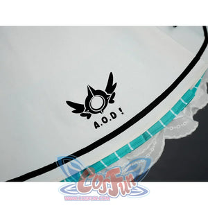 Close-up of A.O.D. winged logo on Aria cosplay costume white skirt with teal lace trim.