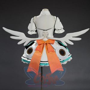 Back view of Aria cosplay costume showing large orange bow, white wings, and teal armor panels.
