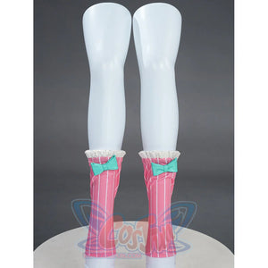 Aria cosplay costume pink striped leg covers with white ruffle tops and teal bow on mannequin legs.