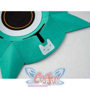 Zenless Zone Zero Aria cosplay prop centers a smiley white cat face on a turquoise circular speaker accessory.