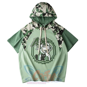 Flat lay of green summer camo monkey shirt showing front design with camo hood and raglan sleeves