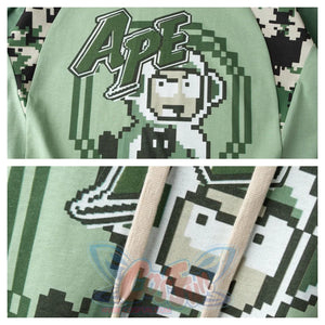 Close-up detail of summer camo monkey shirt showing pixel APE text and monkey graphic design