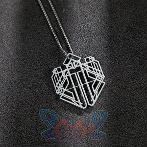 The necklace is entirely silver and has a complex geometric shape.