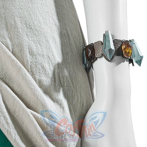 The Legend of Zelda Tears of the Kingdom Princess Zelda cosplay draped garment frames faux-leather bracelet anchoring light.
