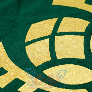 The Legend of Zelda Tears of the Kingdom Princess Zelda cosplay tunic fabric traces gold patterns across dark green textile.