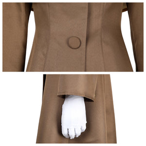 Details of the brown coat in the Detective Peach costume, showing front button and sleeve with white glove.