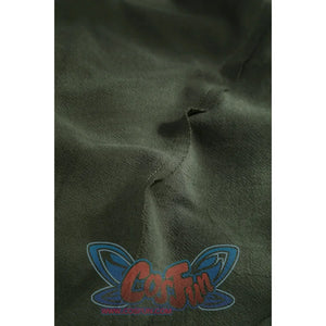 Macro close-up of Dunk cosplay dark green cloak fabric showing wrinkled texture and visible seam line.