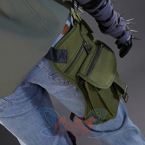 Close-up view of Kyle Crane cosplay costume green waist bag with multiple compartments, orange patch, and wrapped forearm detail