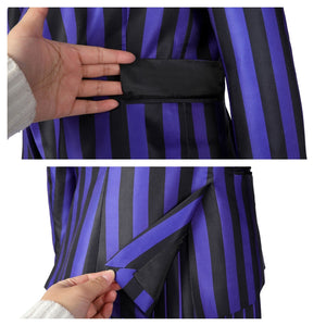Close - up of a hand demonstrating the Nevermore Academy cosplay blazer’s interior and pocket, highlighting functionality and lining, against a plain white background.