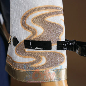 Evanescia cosplay white boot with gold glitter swirl wave embroidery, black buckle strap, and gold leather trim at the base.