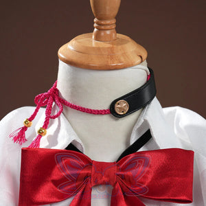 Evanescia cosplay close-up featuring red bow, black collar with gold medallion, and pink tassel accessories