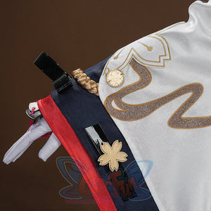 Evanescia cosplay detail showing white sleeve with gold embroidery, decorative belt with sakura emblem and tassels