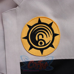 Riyo cosplay costume golden badge patch detail with black spiral embroidery design close-up