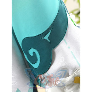 Yaoyao cosplay costume coat sleeve close-up showcasing teal fabric with decorative swirl embroidery pattern