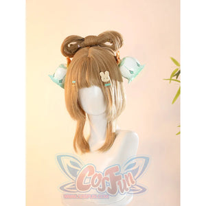 Yaoyao cosplay costume wig featuring brown hair styled in buns with teal ribbon and white hair accessories