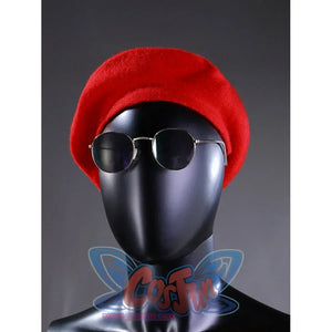 Gustave cosplay accessory close-up showing a red beret and round sunglasses worn on the mannequin
