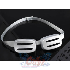 Gyro Zeppeli cosplay goggles prop displayed on dark surface showing dual-lens detail