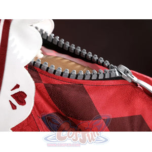 Sparkle cosplay sleeve detail showing zipper trim on red and checkered pattern fabric
