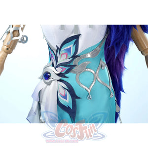 Yao Guang cosplay waist detail with teal dress, decorative butterfly pattern, and silver chain accessories