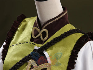 Genshin Impact Yaoyao cosplay top layers light green overlay over brown high-collar base beside gold figure-eight accent.