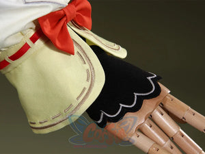 Genshin Impact Yaoyao cosplay glove layers cream cuff beside red bow and black sleeve overlay with scalloped white edging.