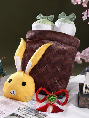 Genshin Impact Yaoyao cosplay backpack centers yellow rabbit-head attachment over diamond-patterned brown plush basket.