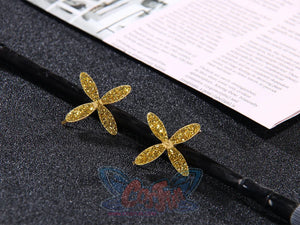 Genshin Impact Yaoyao cosplay hair accessories pair two glittering gold cross-shaped four-petal flower bobby pins.