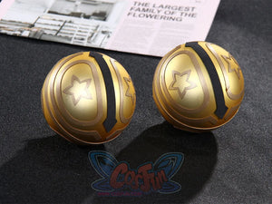 Genshin Impact Yaoyao cosplay hair accessories pair spherical golden orbs beside star emblems and grey ring detailing.
