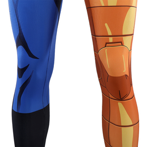 One pant leg features a gold print, while the other has a blue-and-black print.