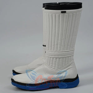 White chef boots with black soles on a gray background